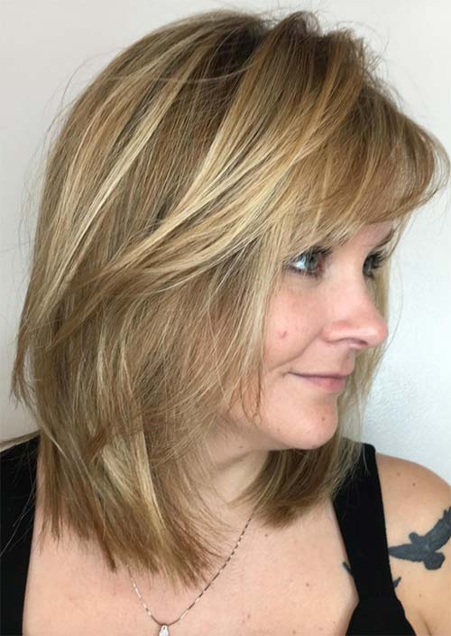 Haircuts & Hairstyles for Women Over 50: Medium Fringed Lowlights