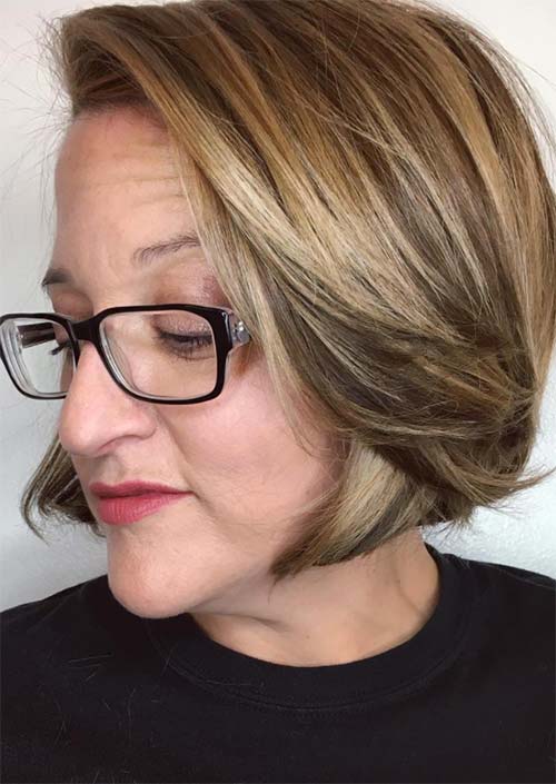 Haircuts & Hairstyles for Women Over 50: Side-Swept Highlighted Short Hair