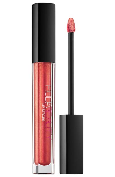 Best Red Lipsticks for Medium Skin Tones: Huda Beauty Lip Strobe in Saucey