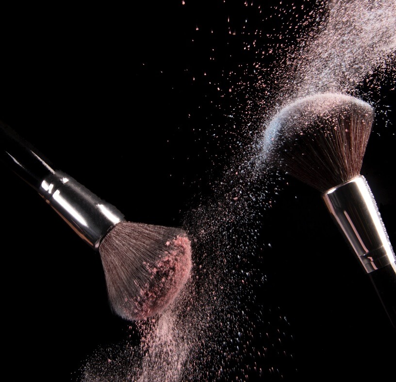 cosmetics makeup brushes and powder dust explosion