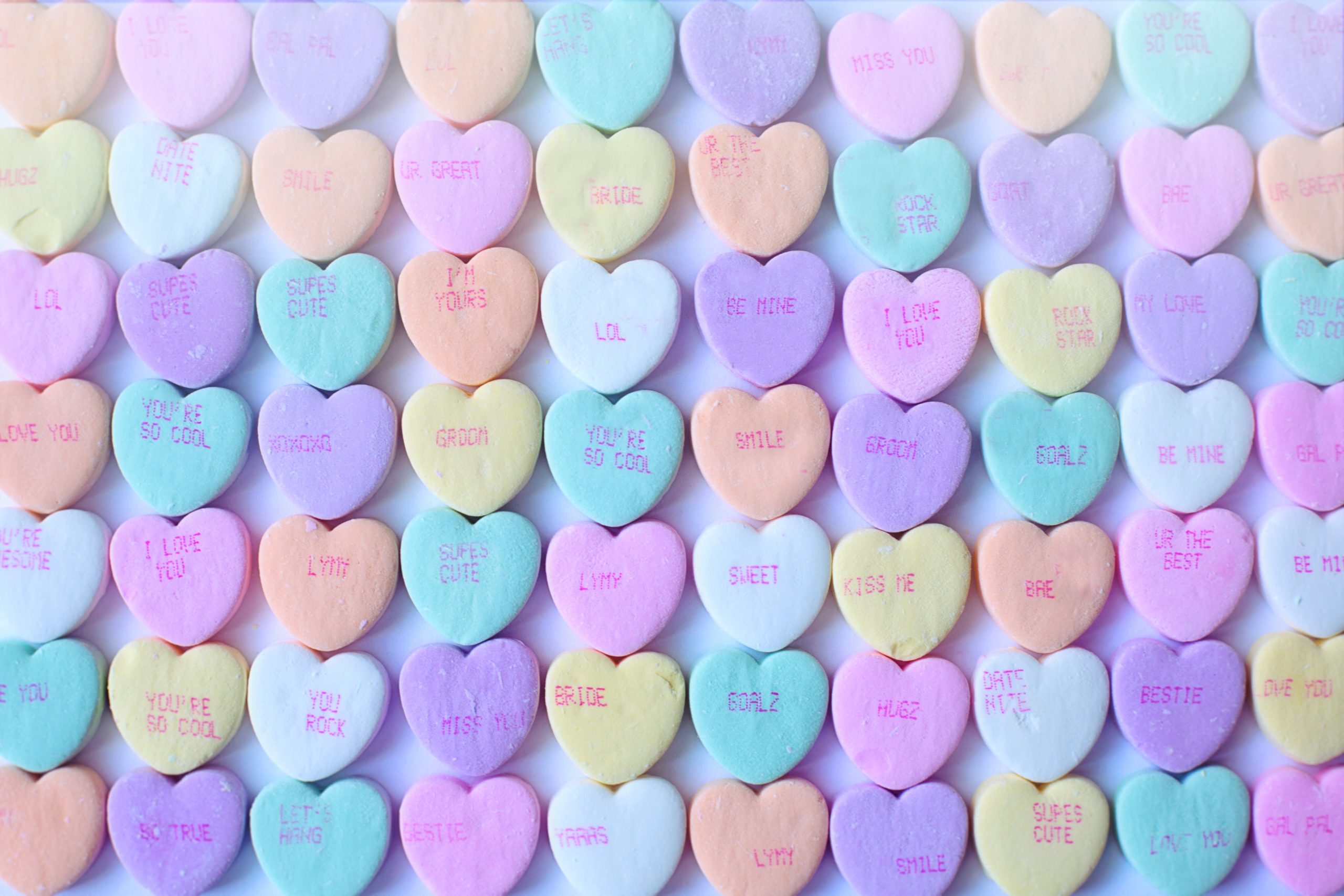 valentine's day heart shaped candies in pastel colors